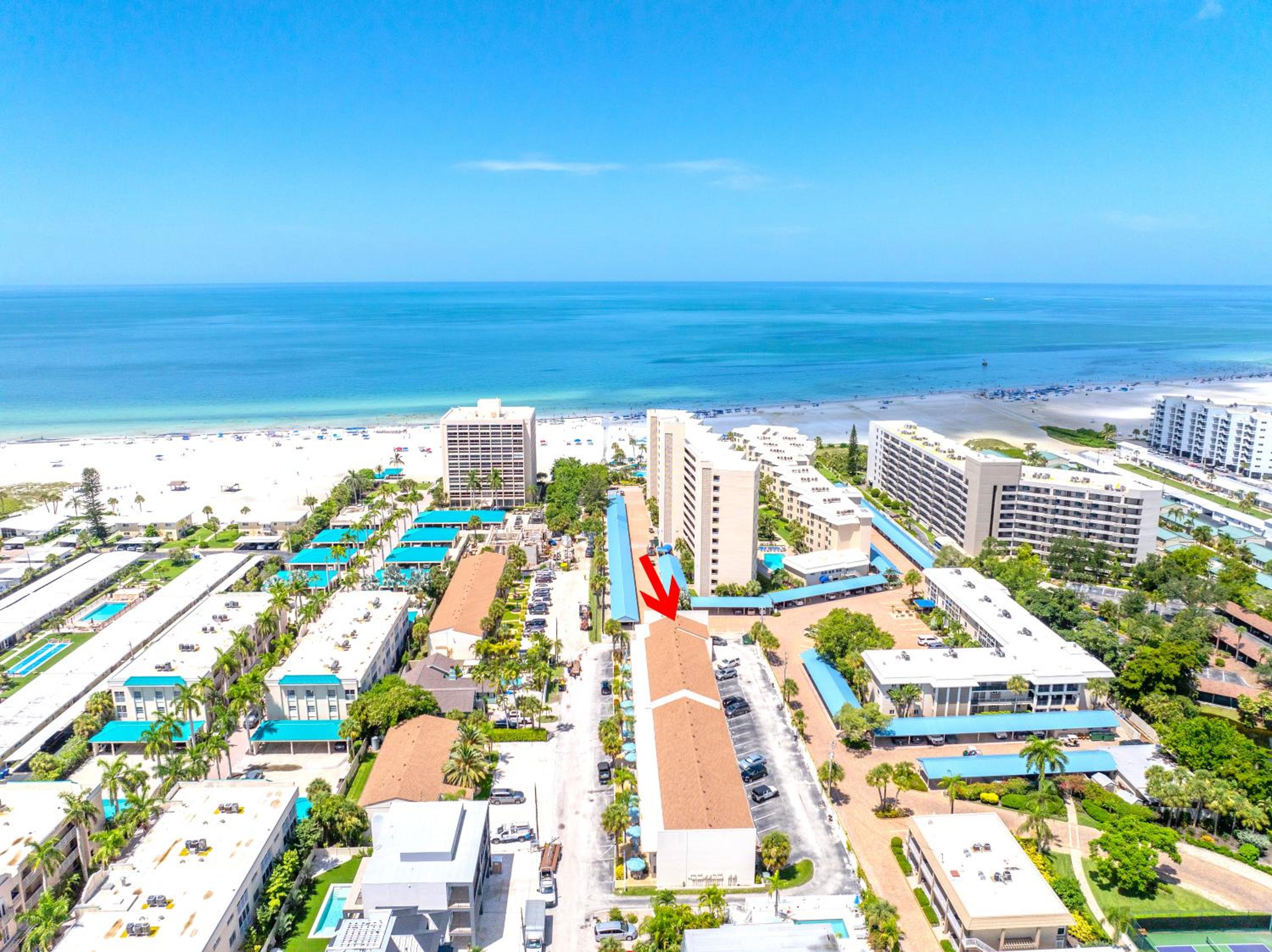 New Listing! 400ft to private beach path, private patio, shared pool, glimpse of ocean from bedroom! view 4