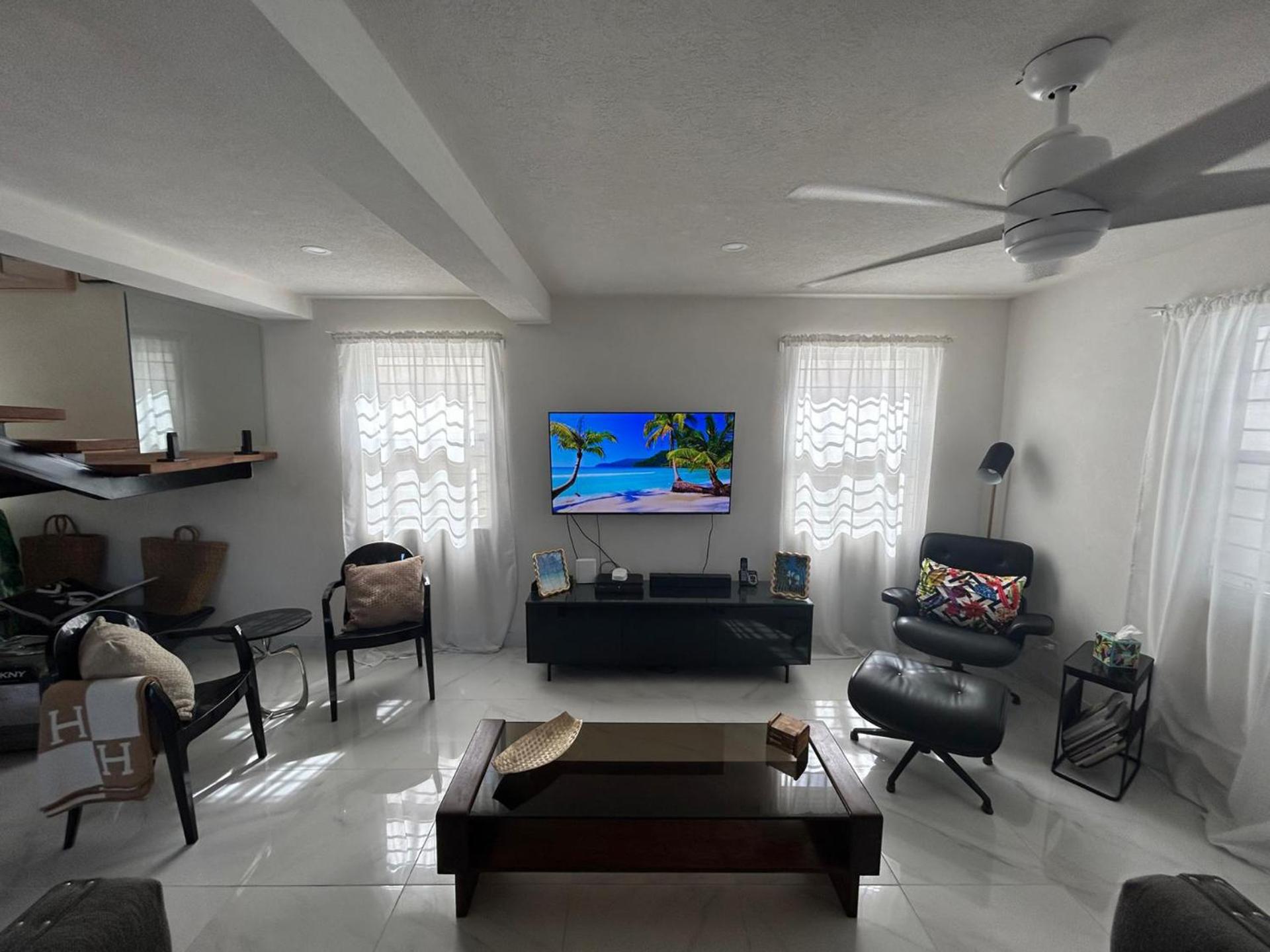 Kick back and relax in this calm, stylish space