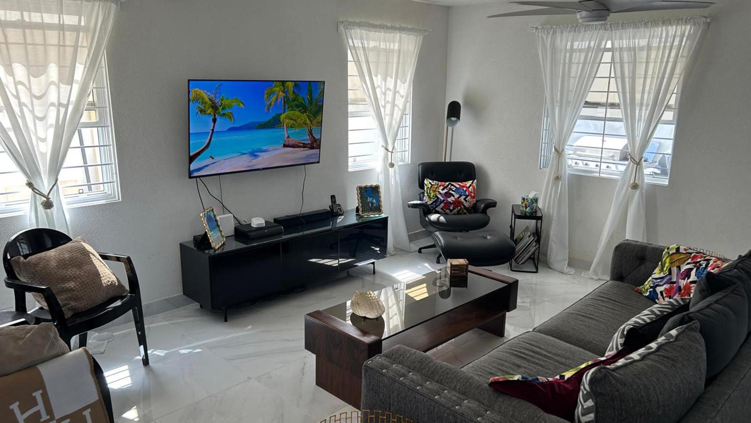 Kick back and relax in this calm, stylish space