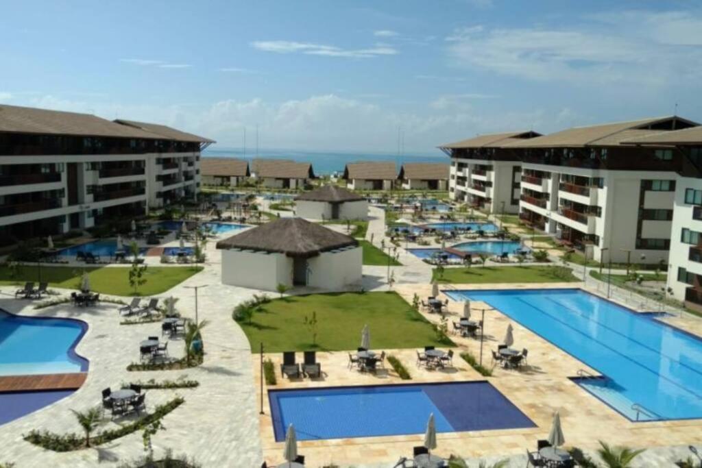 Cupe Beach Living - Flat Luxo 2 suítes decorado térreo frente piscina