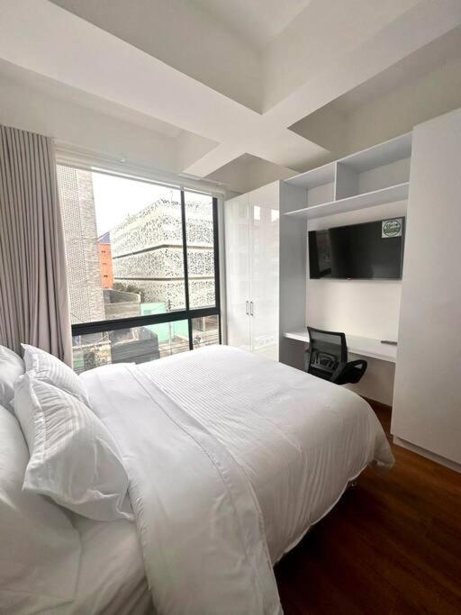 Modern Hotel Apartment with Dedicated Workspace