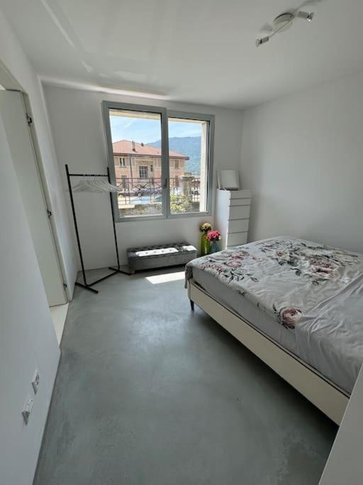 Neue Gartenwohnung mit Sicht auf den Luganersee