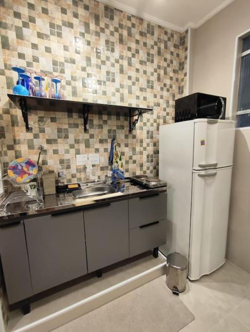 Apartamento em Santos na Beira mar com Vaga privativa e Wifi