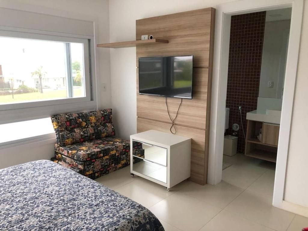 Casa Luxuosa no Condomínio Villaggio Atlântida
