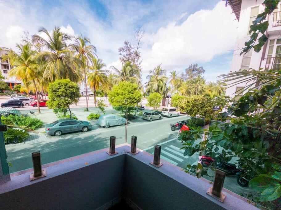 Cozy 1BR apartment by beach - partial ocean view