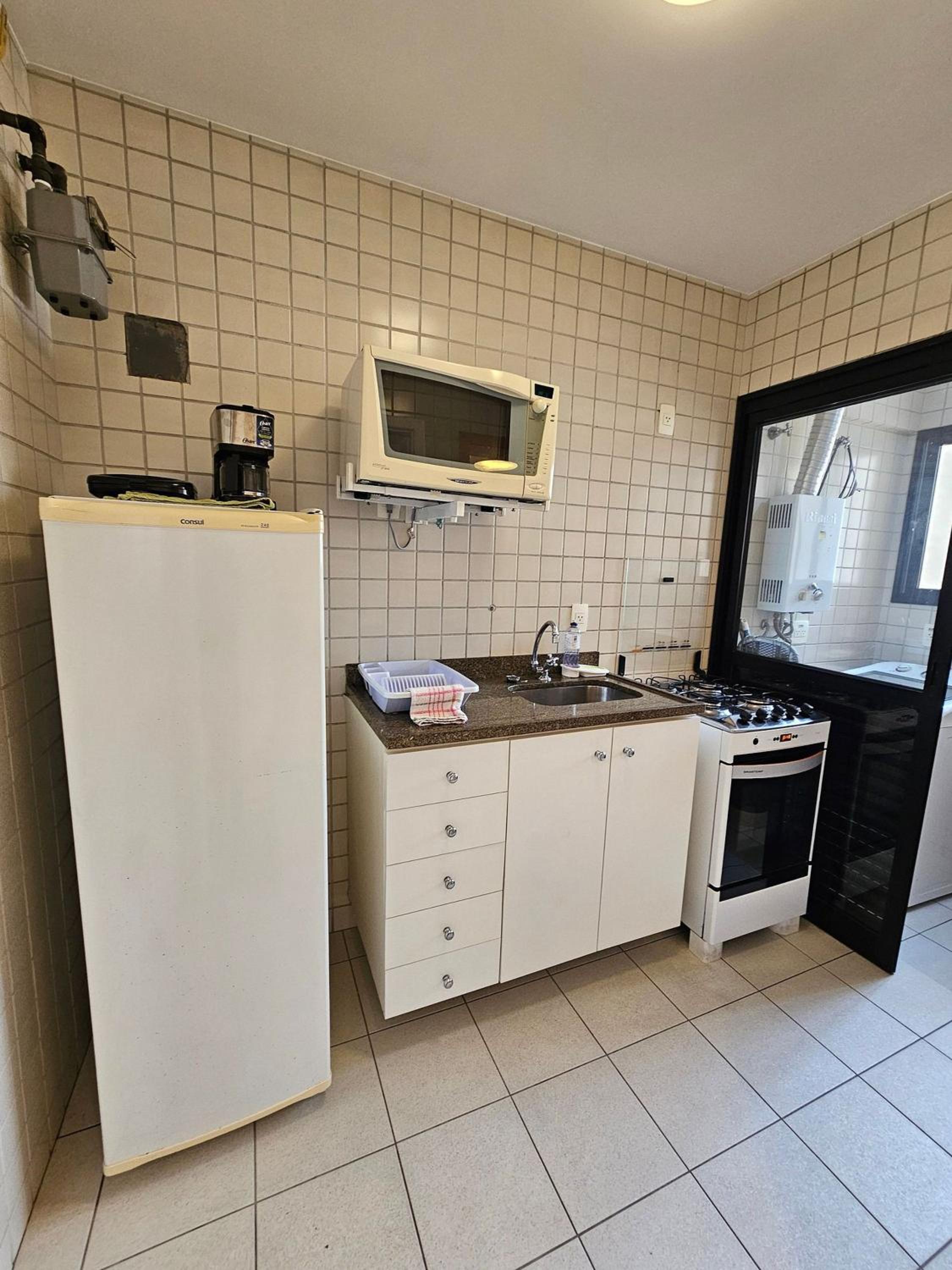 Flat Là Maison DStan com quarto e sala cozinha uh105
