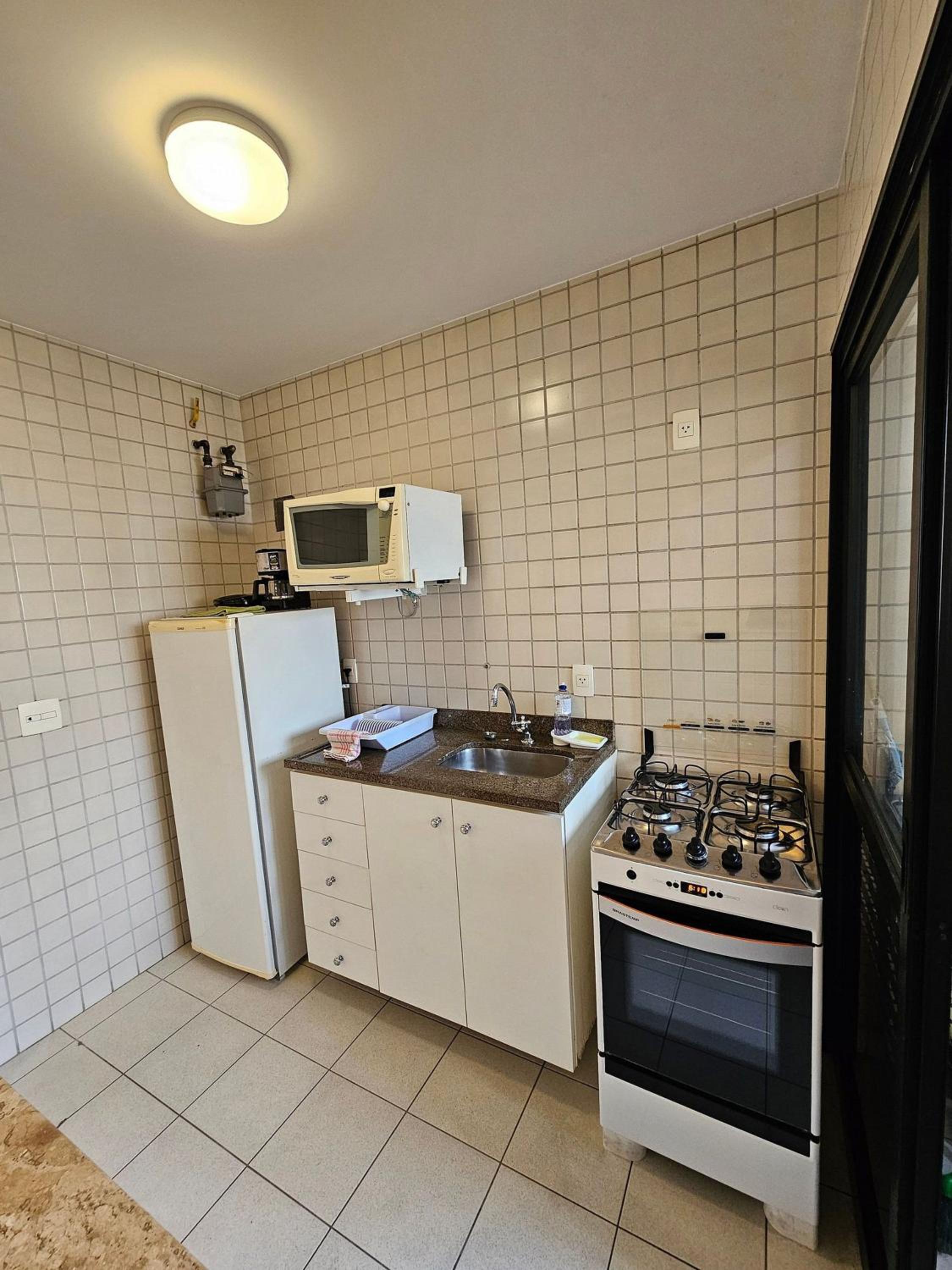Flat Là Maison DStan com quarto e sala cozinha uh105