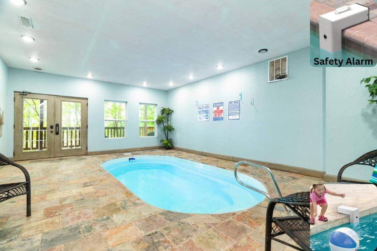 Andrea Bear Great Location Indoor Pool Theater view 3