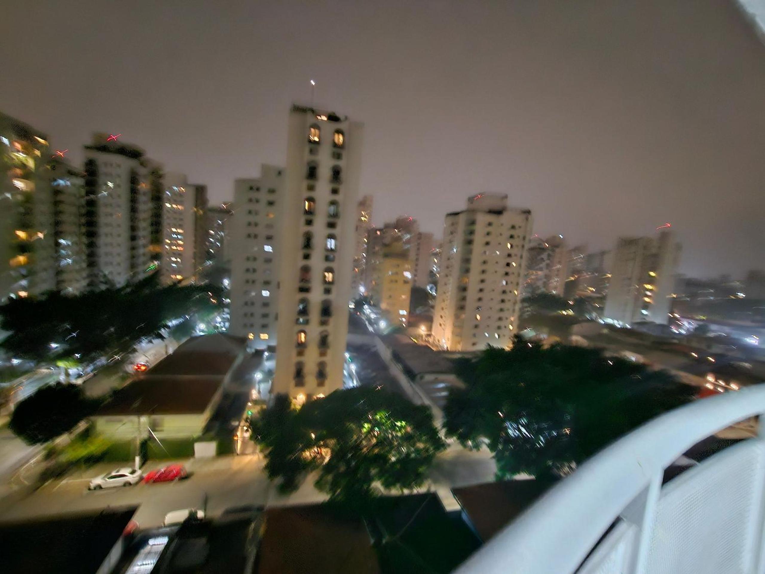 Flat Hotel The Palace com quarto sala e cozinha