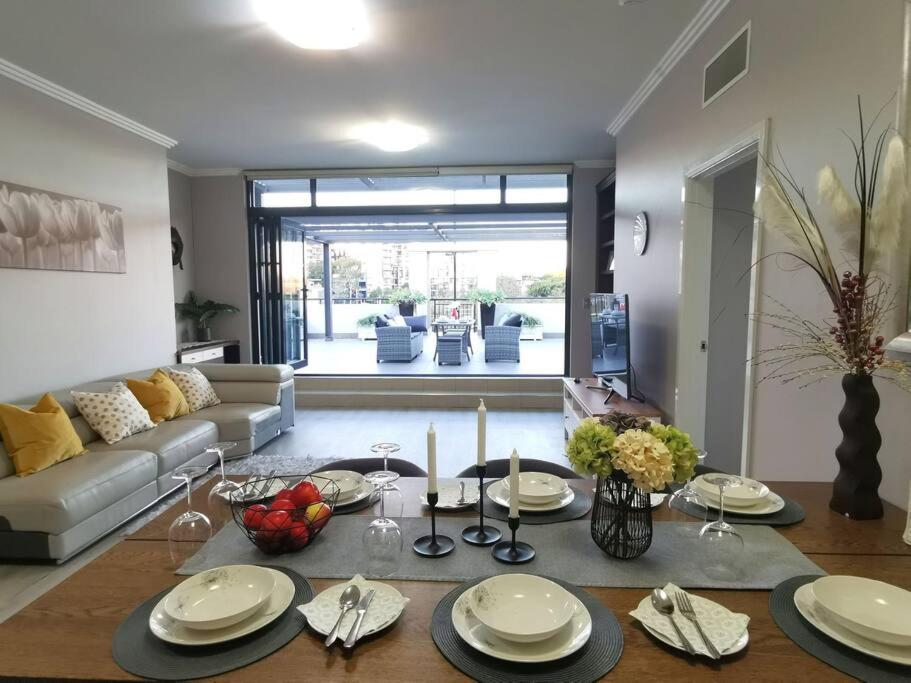 Breathtaking Waterfront Penthouse with BigTerrace near to Olympic Park
