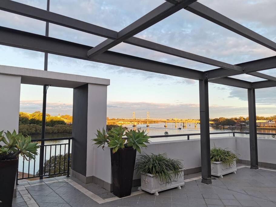 Breathtaking Waterfront Penthouse with BigTerrace near to Olympic Park