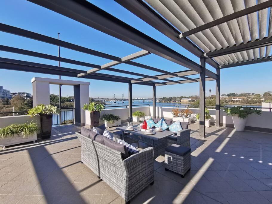 Breathtaking Waterfront Penthouse with BigTerrace near to Olympic Park