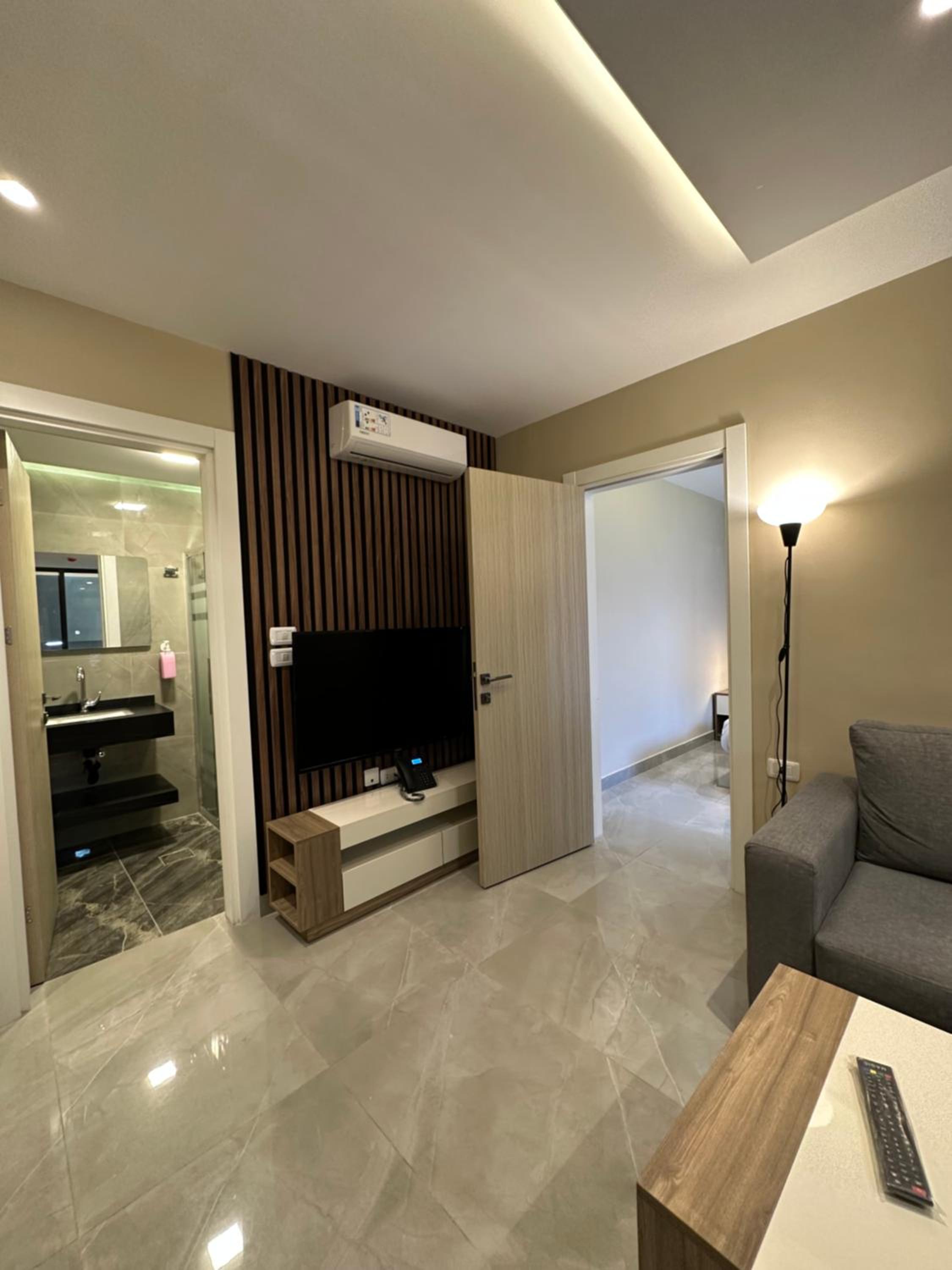 001 AL-NAJEH JRE Apartments For Rent ave view 3