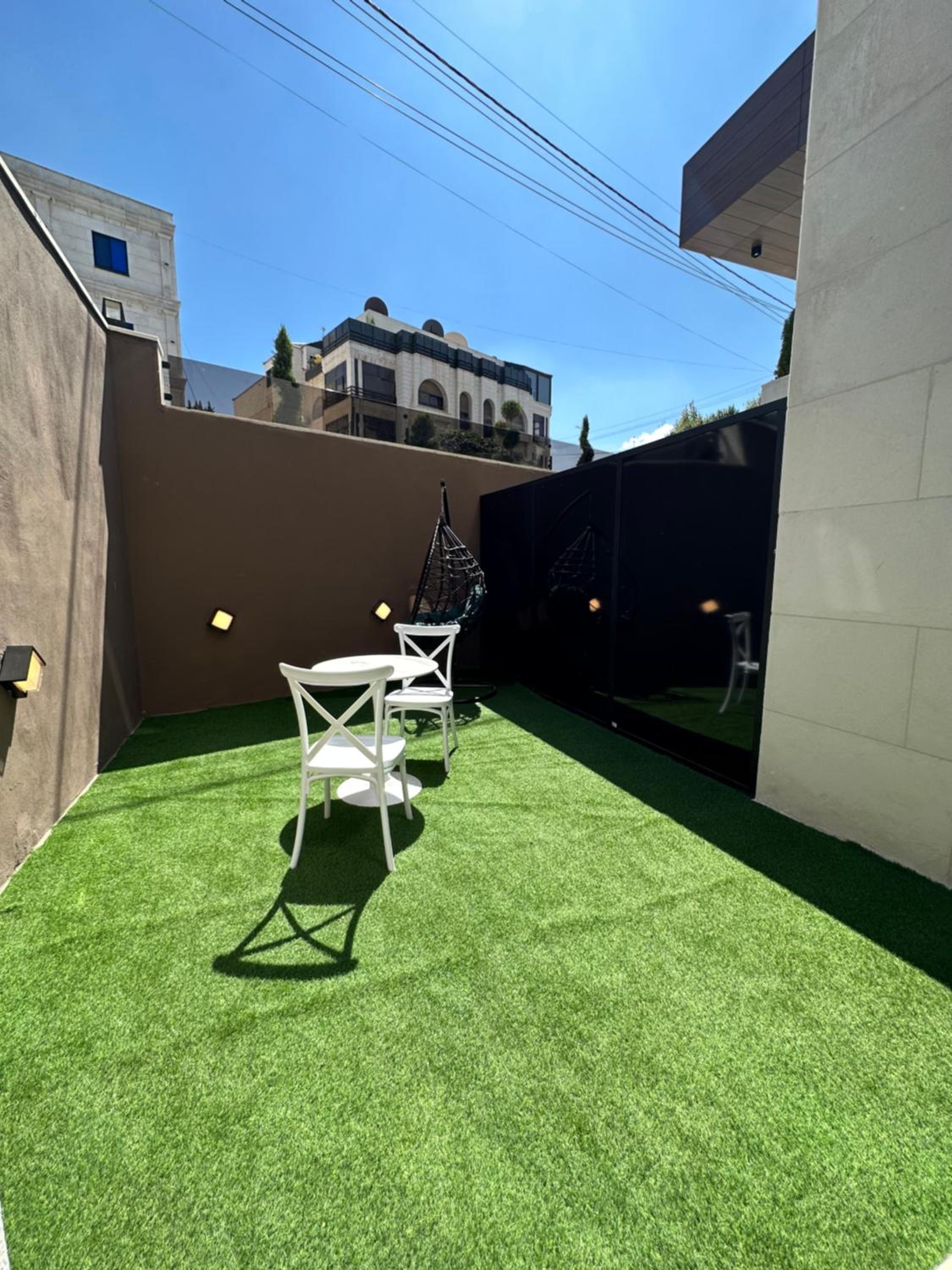 002 AL-NAJEH JRE Apartments For Rent ave view 2