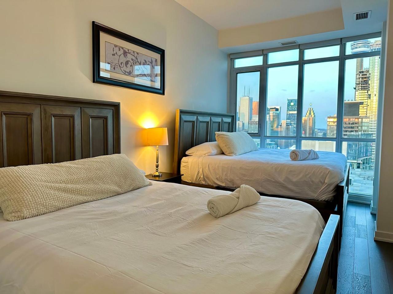 City/Lake view 2-storey condo w/parking