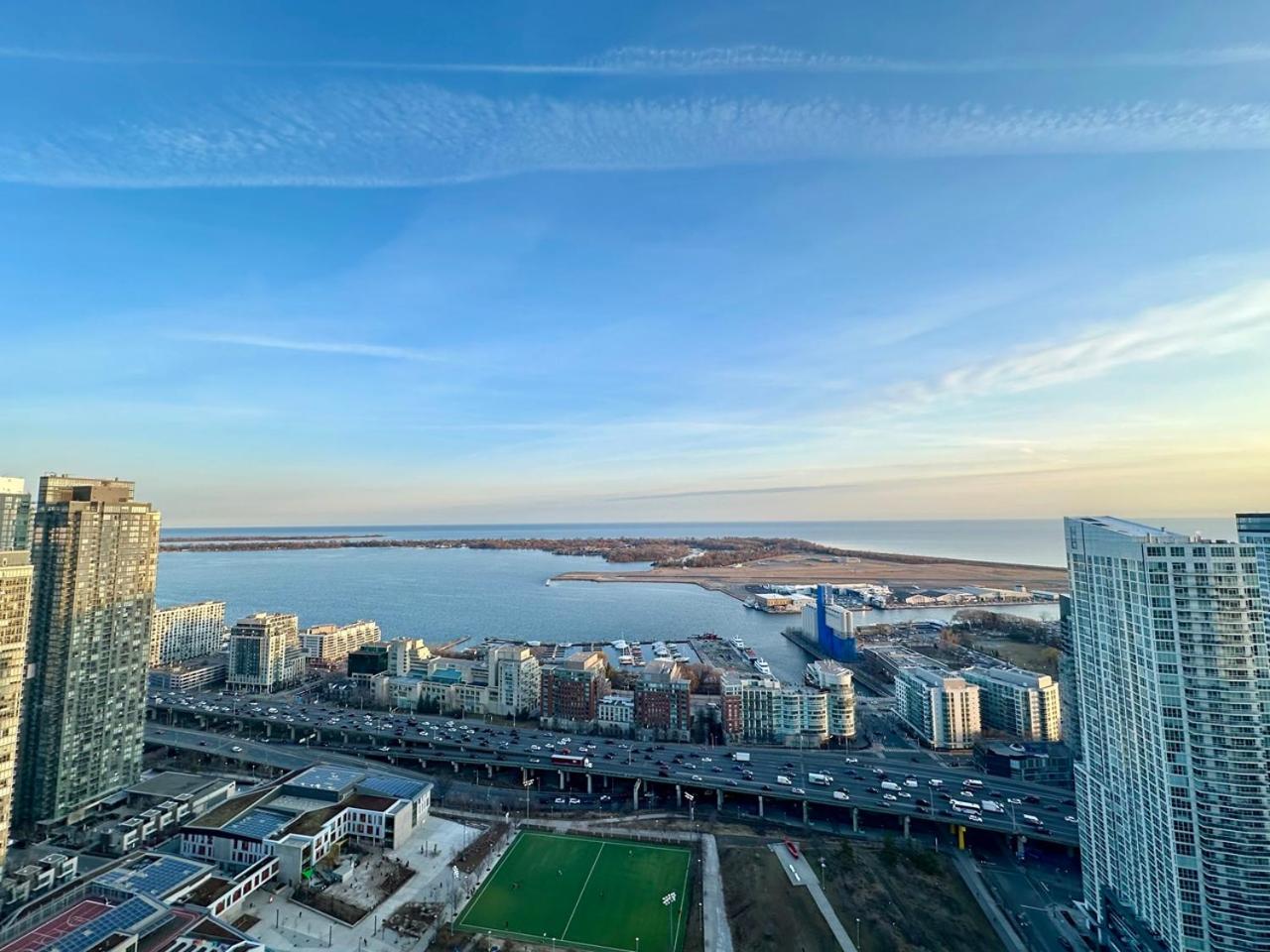 City/Lake view 2-storey condo w/parking
