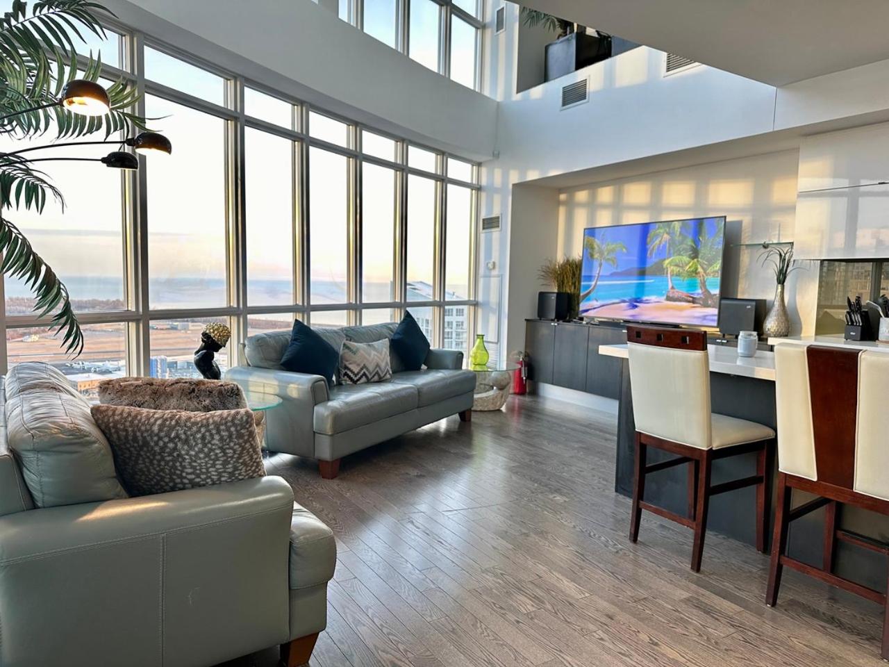 City/Lake view 2-storey condo w/parking