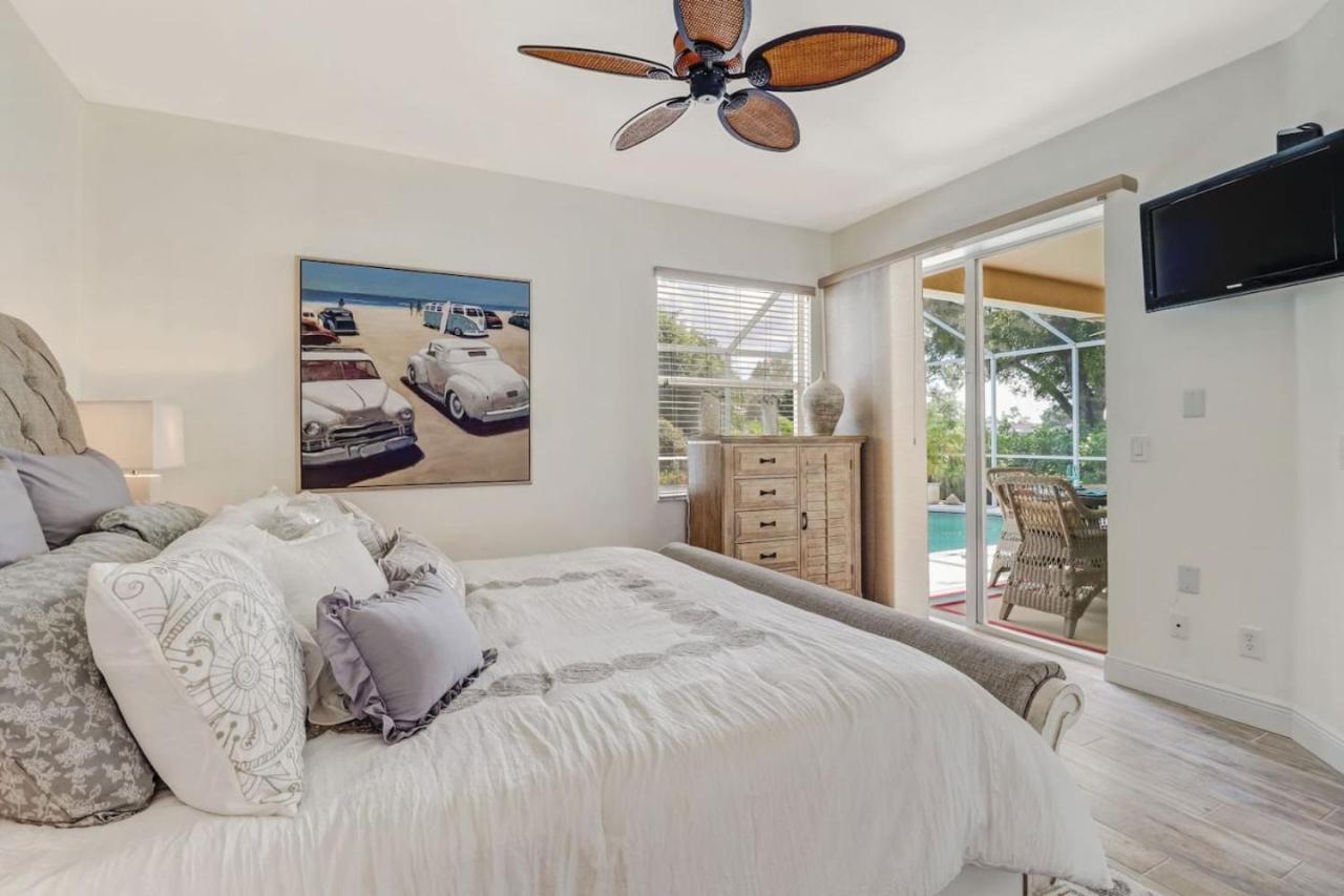 Sunshine days Stunning pool home. Gated community view 4