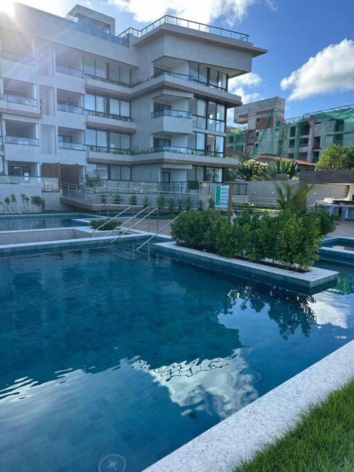 Apartamento térreo com piscina beira mar de Porto de Galinhas