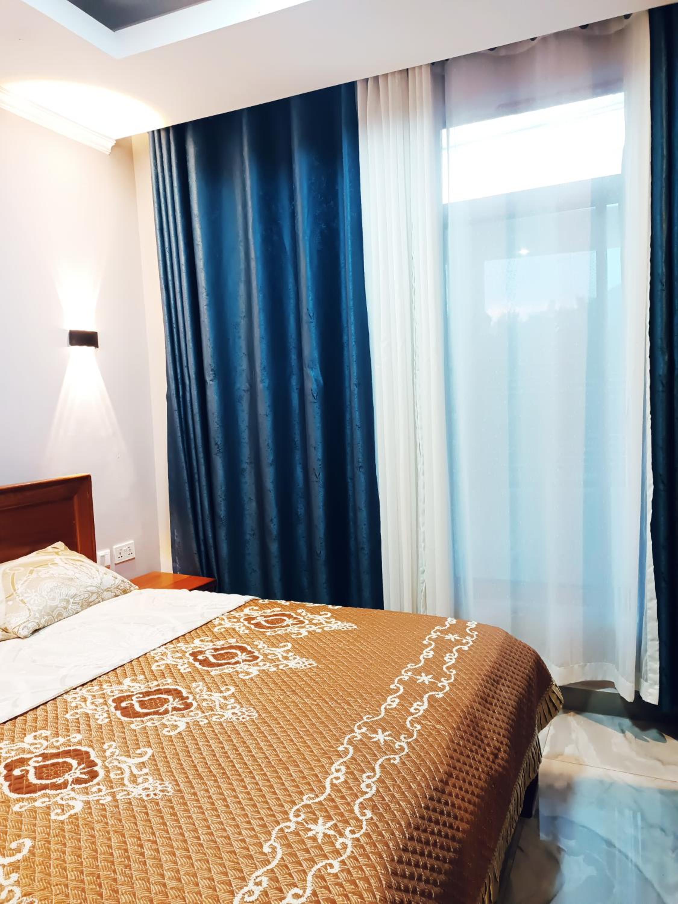 Rober Apartment kibagabaga view 4