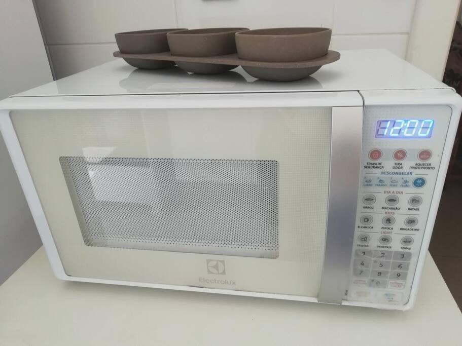Lindo Apt na Prainha com Varanda Gourmet e 2 vagas