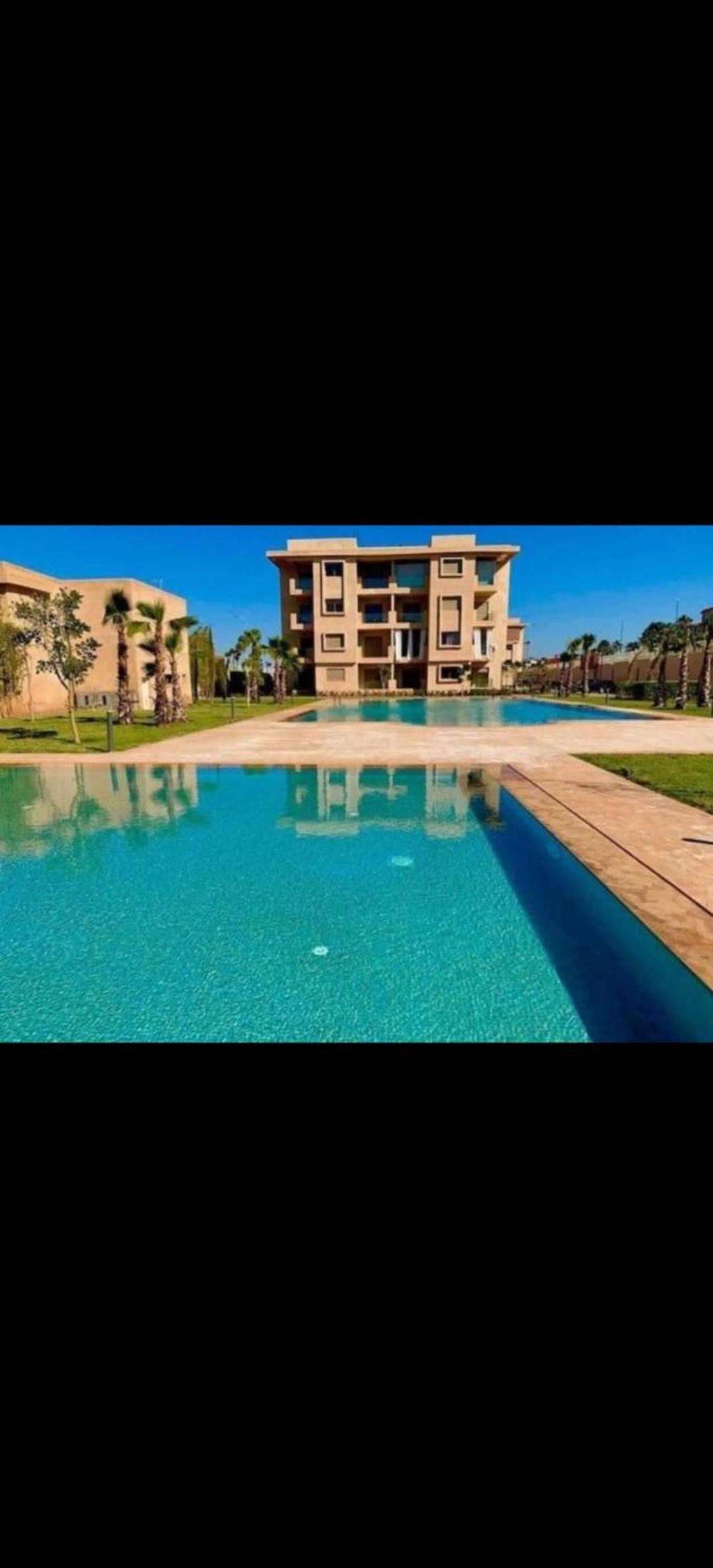 Appartement au coeur de Marrakech avec deux piscines et une charmante vue view 4