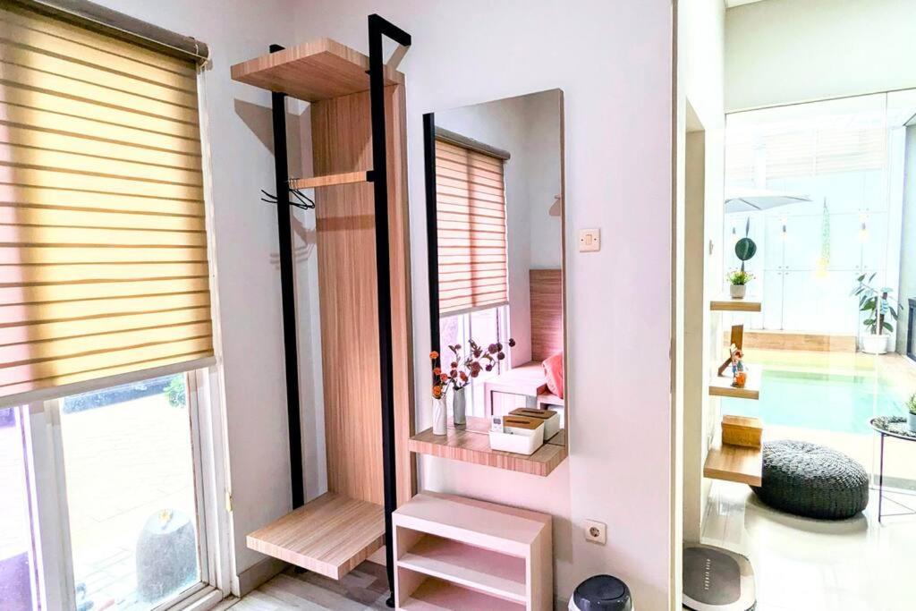 Cottonwood Villa Kuantan Jogja - Pool Netflix Gym view 4