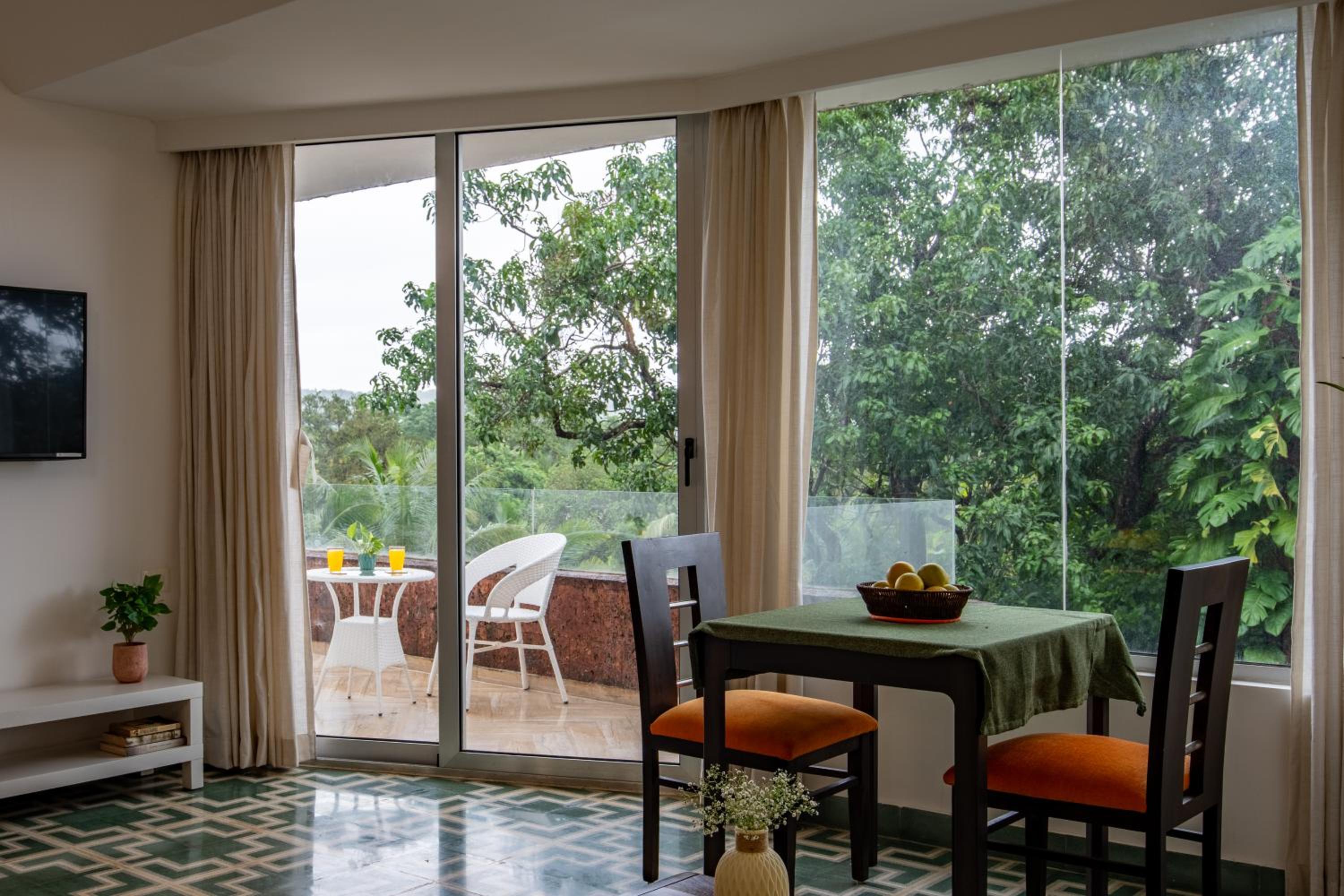 El Raso by The Blue Kite - Premium 1 BHK Apartments with Shared Pool, just 2 mins drive from famous Parra Coconut Tree Road, 24x7 Security, Kitchen