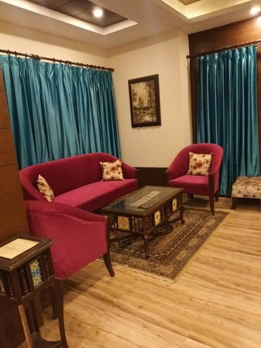Aurora 4BHK villa with fireplace and terrace by Homeyhuts