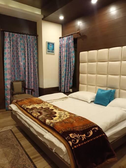 Aurora 4BHK villa with fireplace and terrace by Homeyhuts