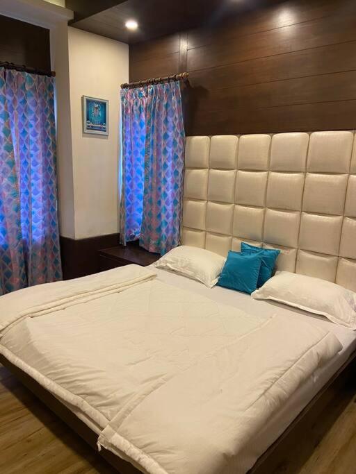 Aurora 4BHK villa with fireplace and terrace by Homeyhuts