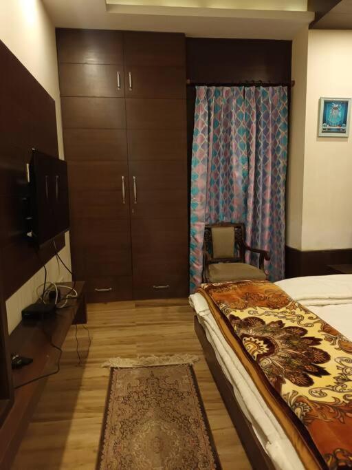 Aurora 4BHK villa with fireplace and terrace by Homeyhuts
