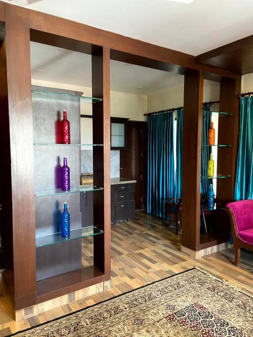Aurora 4BHK villa with fireplace and terrace by Homeyhuts