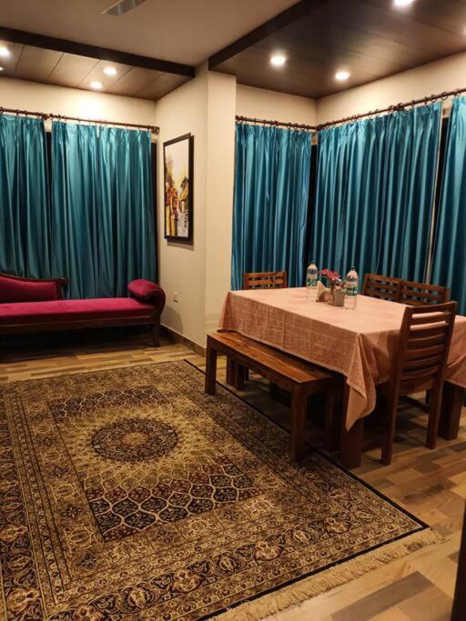 Aurora 4BHK villa with fireplace and terrace by Homeyhuts