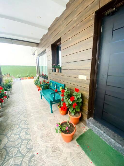 Aurora 4BHK villa with fireplace and terrace by Homeyhuts