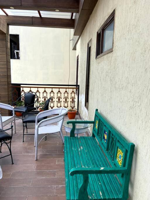 Aurora 4BHK villa with fireplace and terrace by Homeyhuts