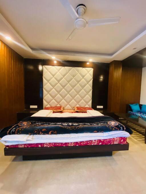 Aurora 4BHK villa with fireplace and terrace by Homeyhuts