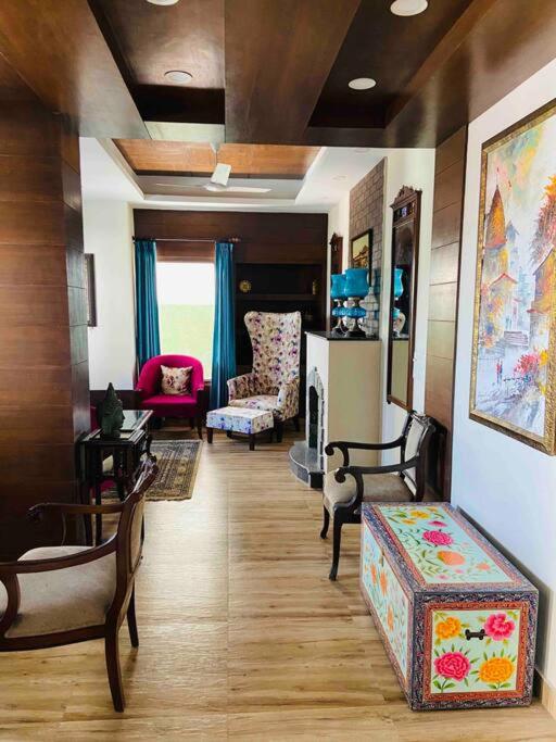 Aurora 4BHK villa with fireplace and terrace by Homeyhuts