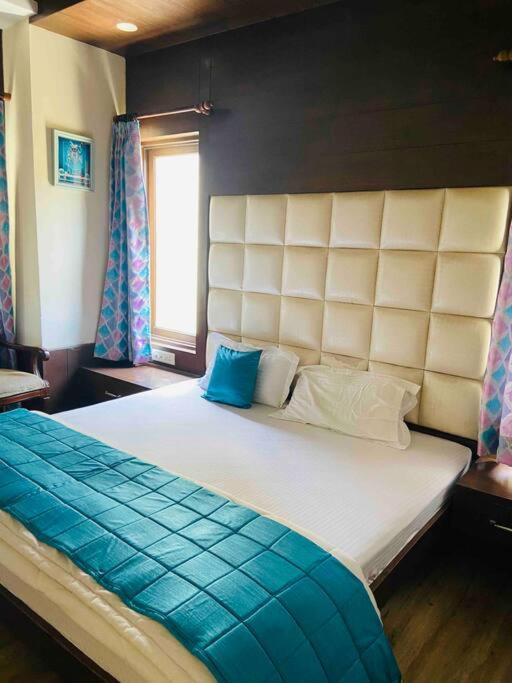 Aurora 4BHK villa with fireplace and terrace by Homeyhuts