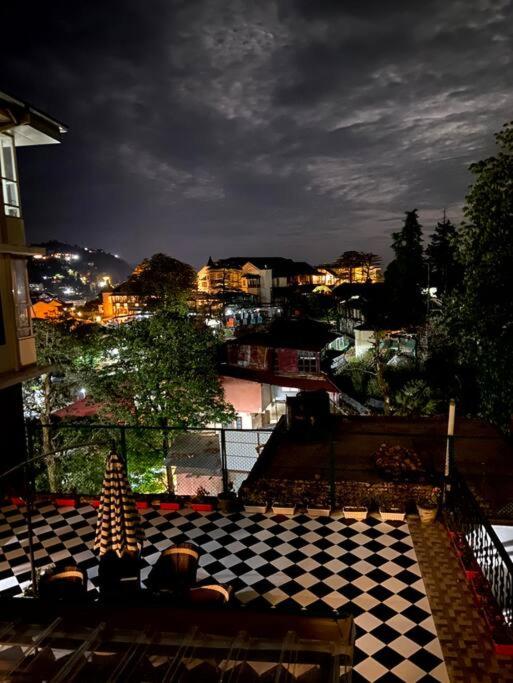 Aurora 4BHK villa with fireplace and terrace by Homeyhuts