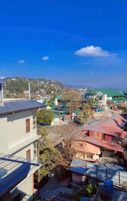 Aurora 4BHK villa with fireplace and terrace by Homeyhuts