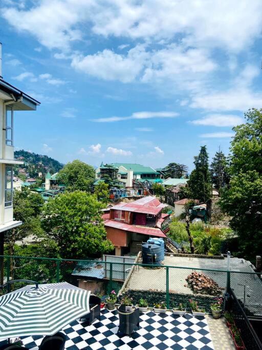 Aurora 4BHK villa with fireplace and terrace by Homeyhuts
