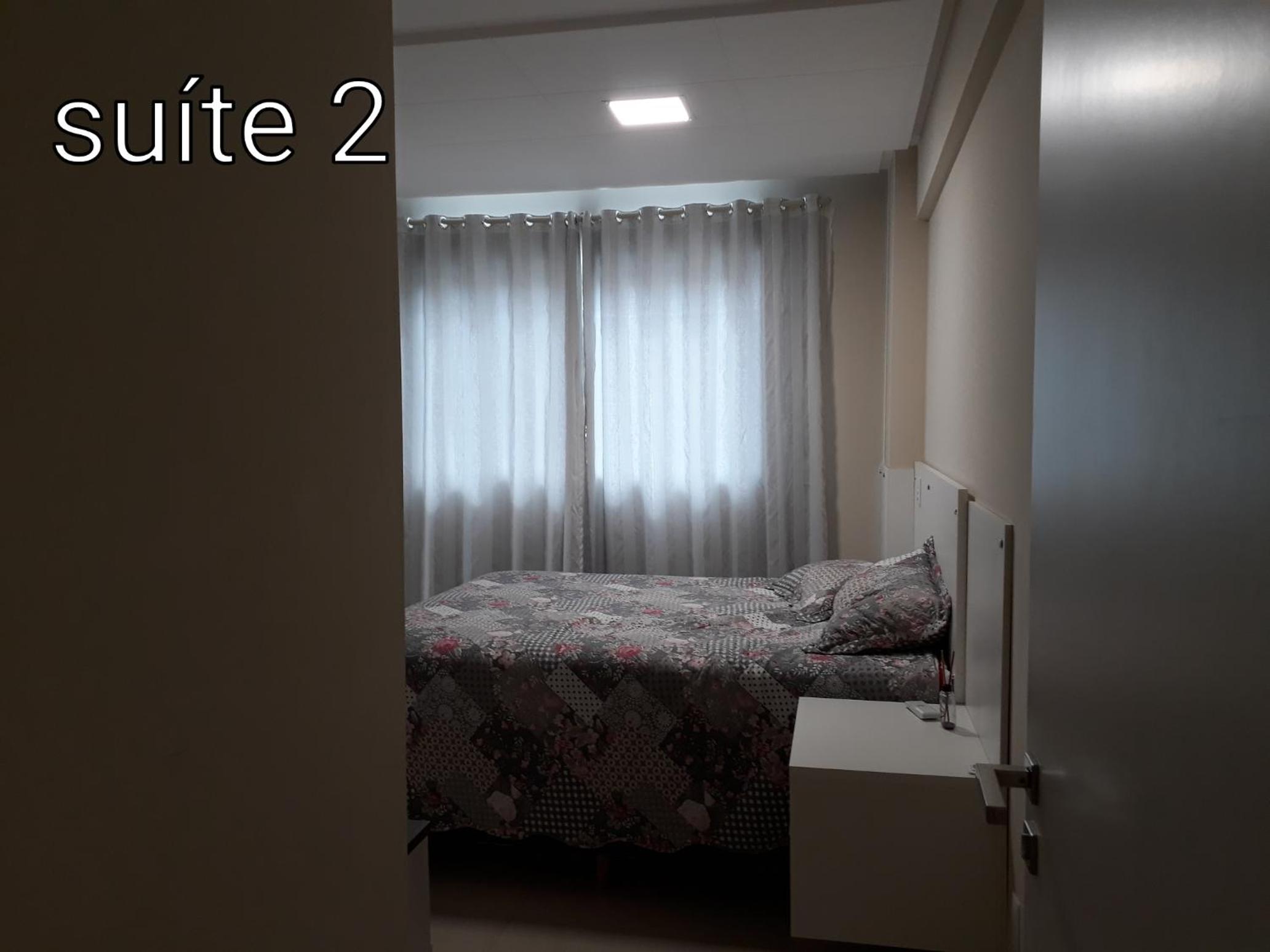 Apartamento em meia praia aconchegante
