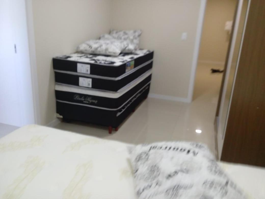 Apartamento em meia praia aconchegante