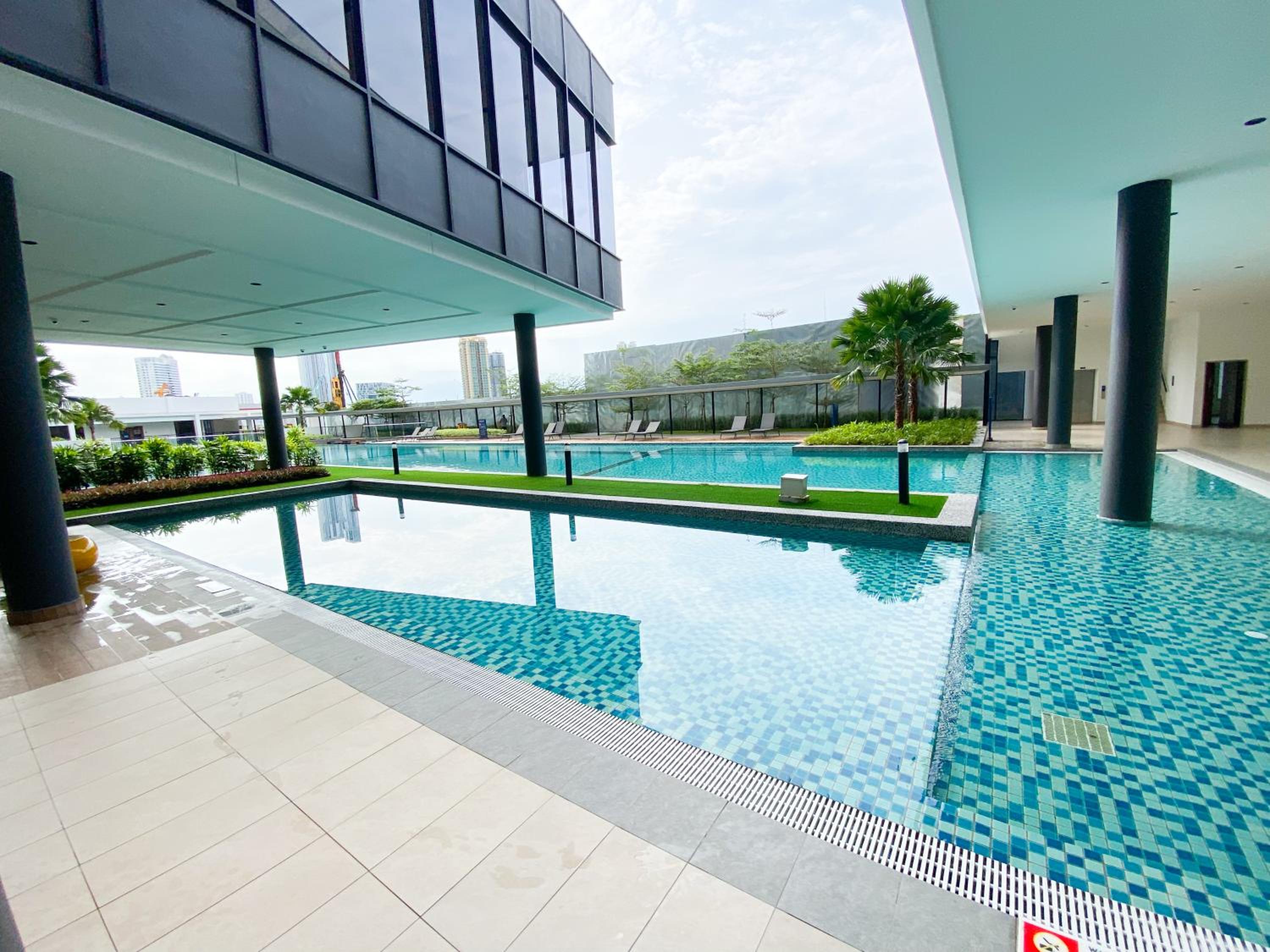 Veranda-2BR,4pax I 5mins to CIQ and KSL I Fast-Wifi