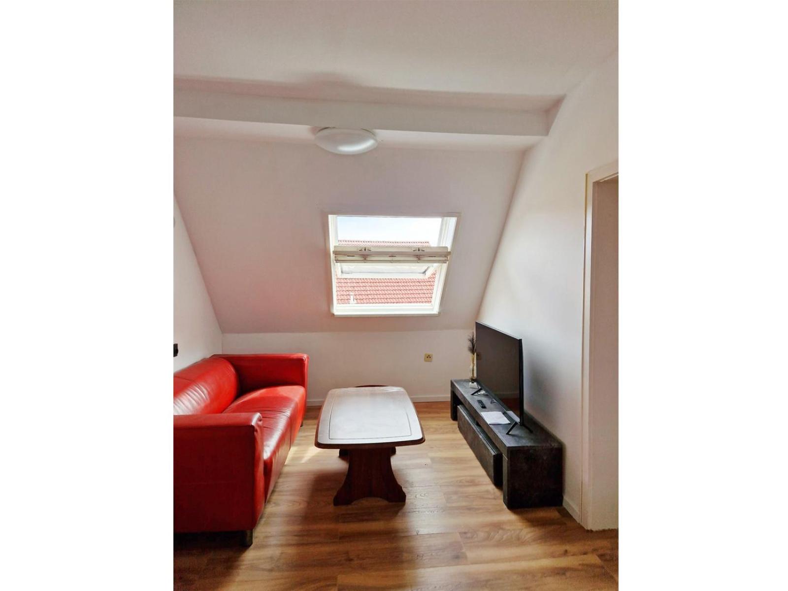 Wohnung Beth im Dachgeschoss mit Balkon