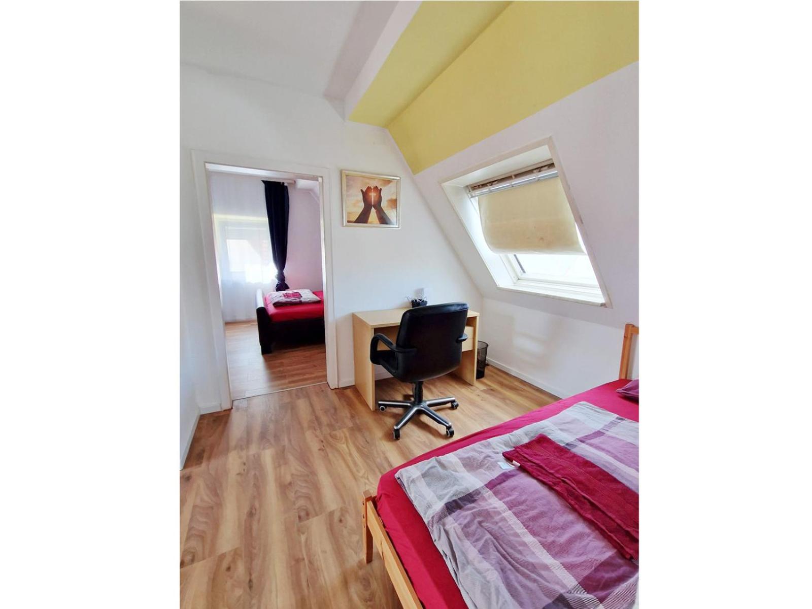 Wohnung Beth im Dachgeschoss mit Balkon
