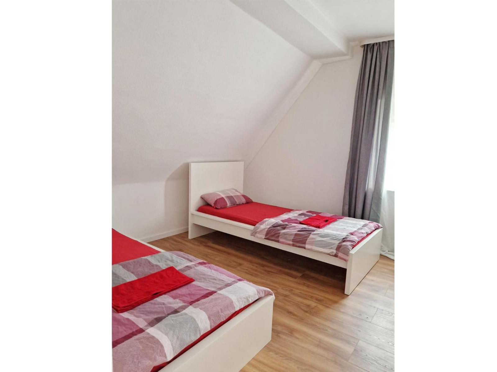 Wohnung Beth im Dachgeschoss mit Balkon