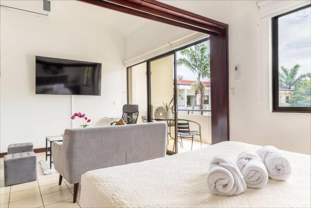 Apt Orquidea in Santa Ana! AC, Wifi, Pool and Gym