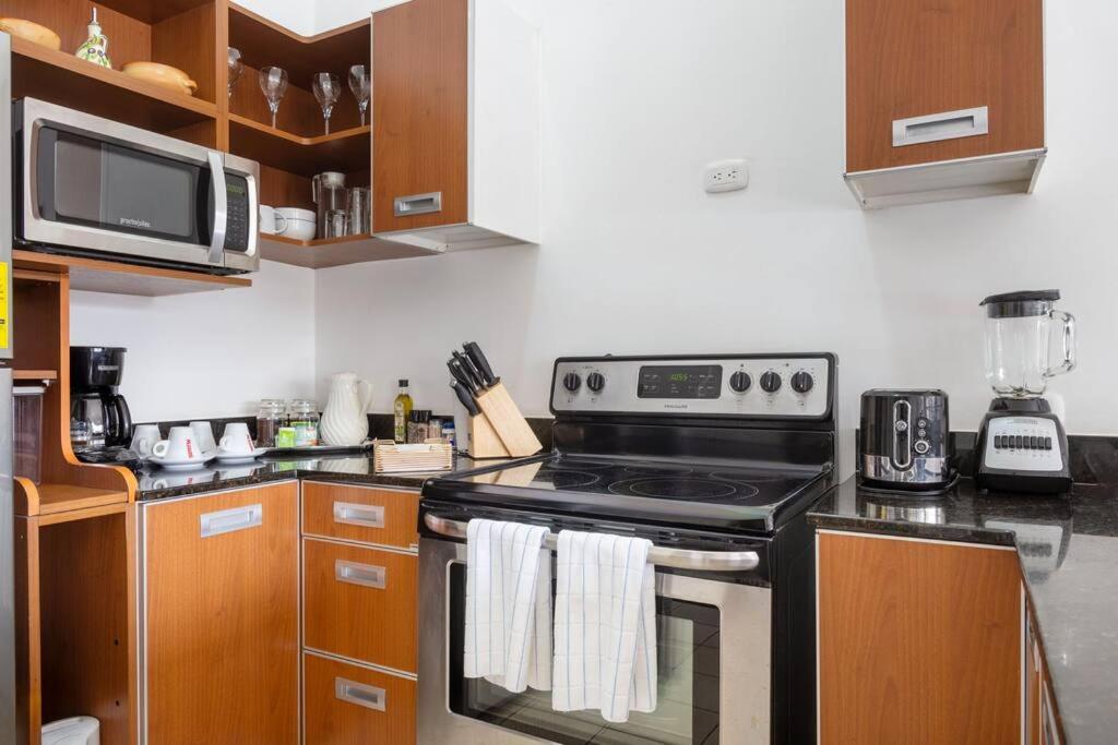 Apt Orquidea in Santa Ana! AC, Wifi, Pool and Gym